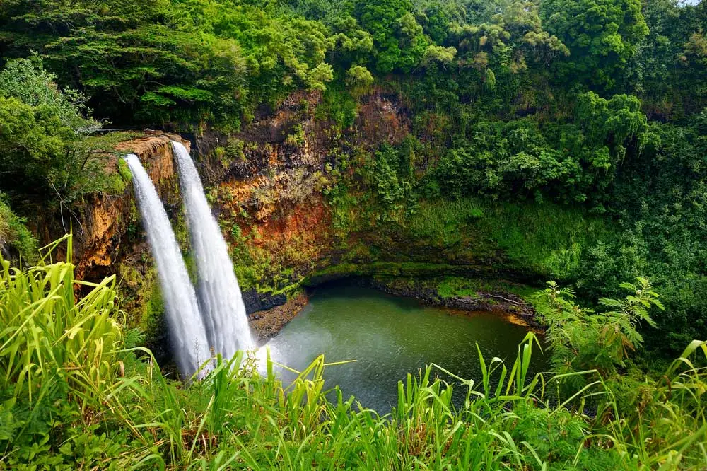 esta usa Majestic twin Wailua waterfalls on Kauai, Hawaii